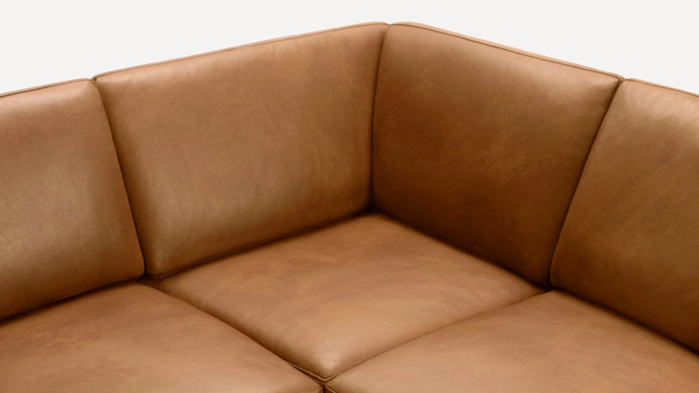Nomad Leather 6-Seat Corner Sectional with Reversible Chaise and Ottoman
